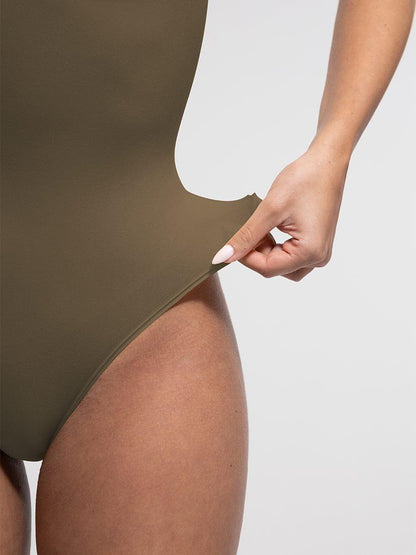 Seamless Bust Support Waist and Abdomen Control Thong Bodysuit -